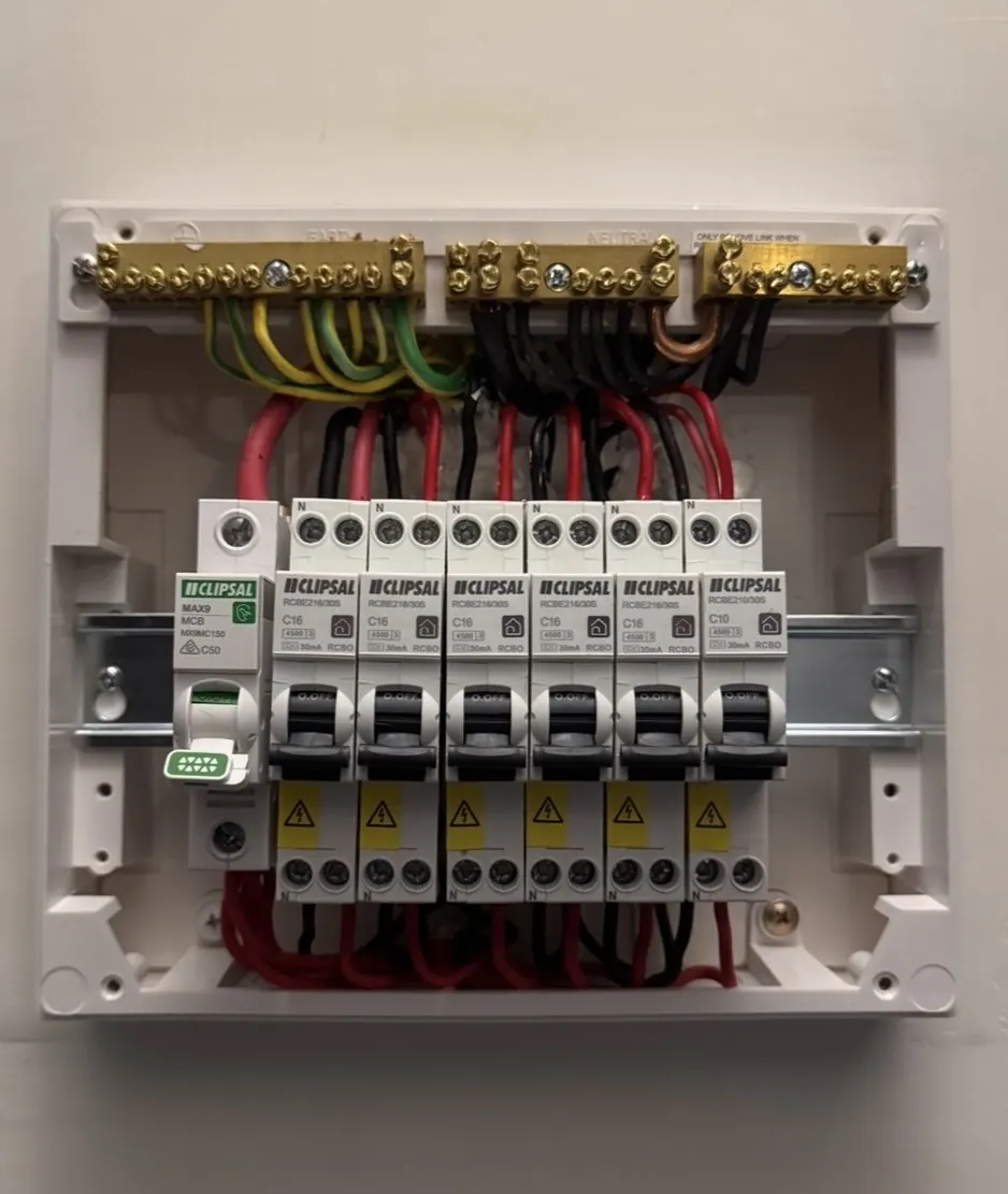 New Clipsal switchboard wiring with safety switches, cover open
