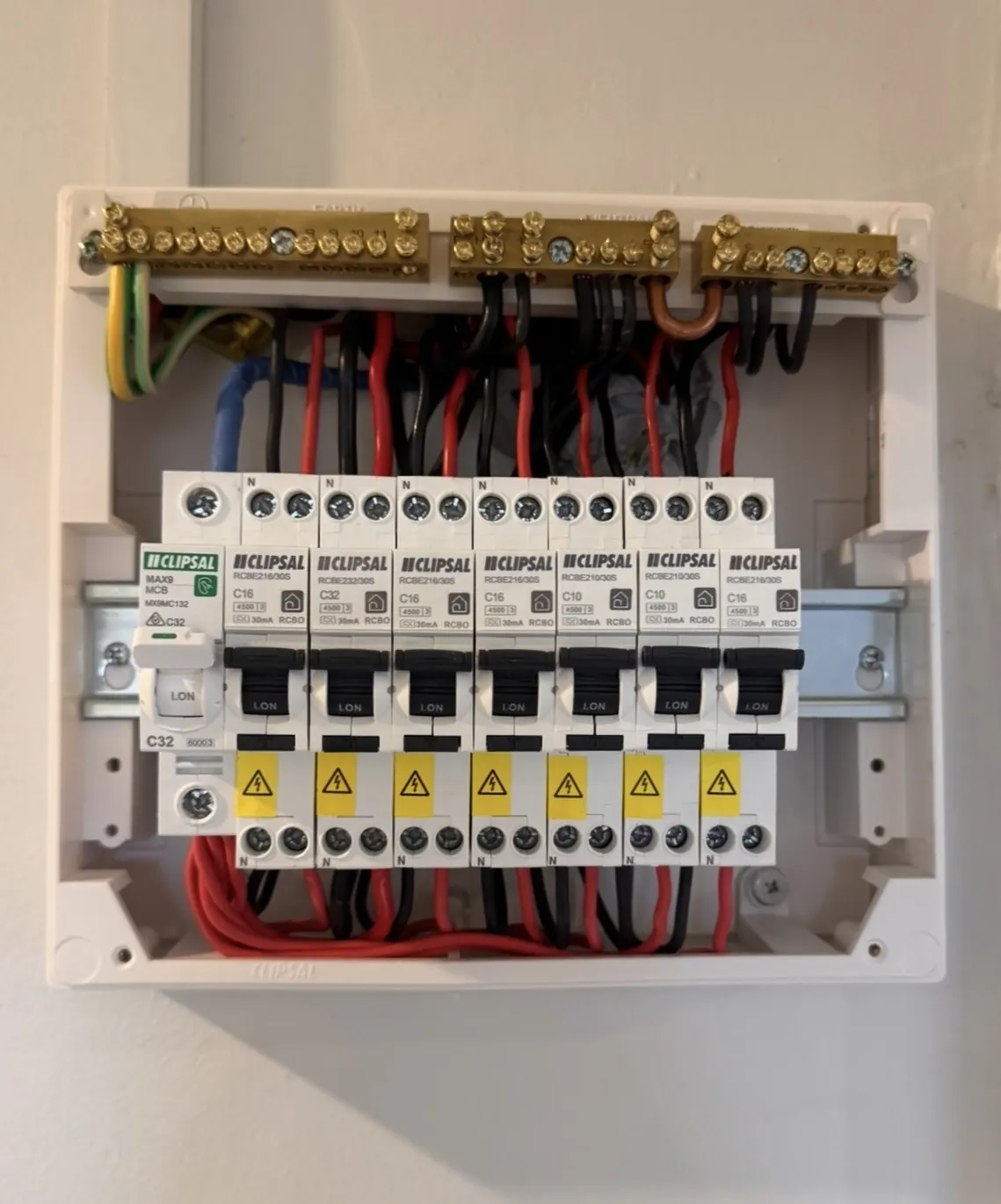New switchboard with circuit breakers and safety switches, cover open