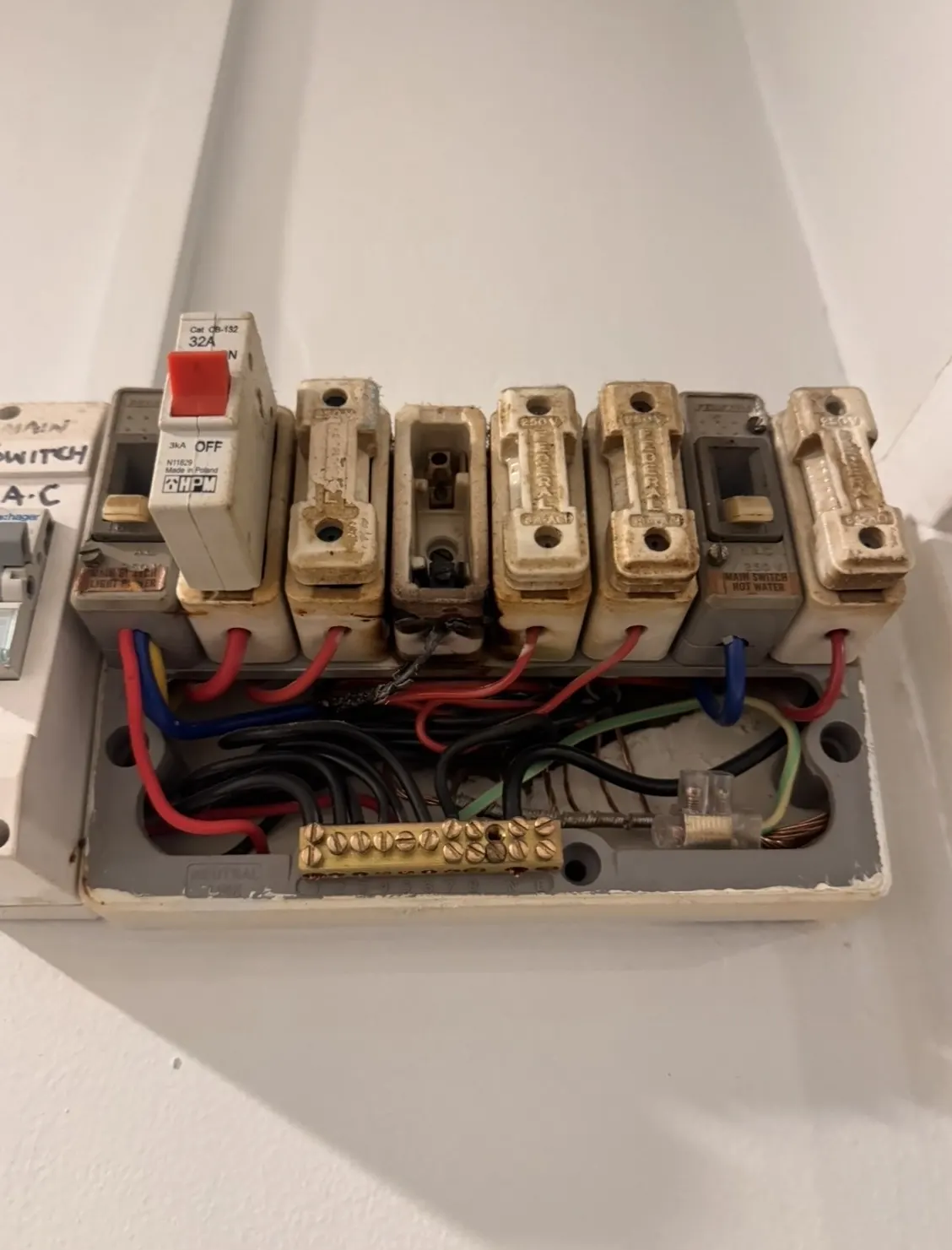 Old ceramic-fuse switchboard before upgrade